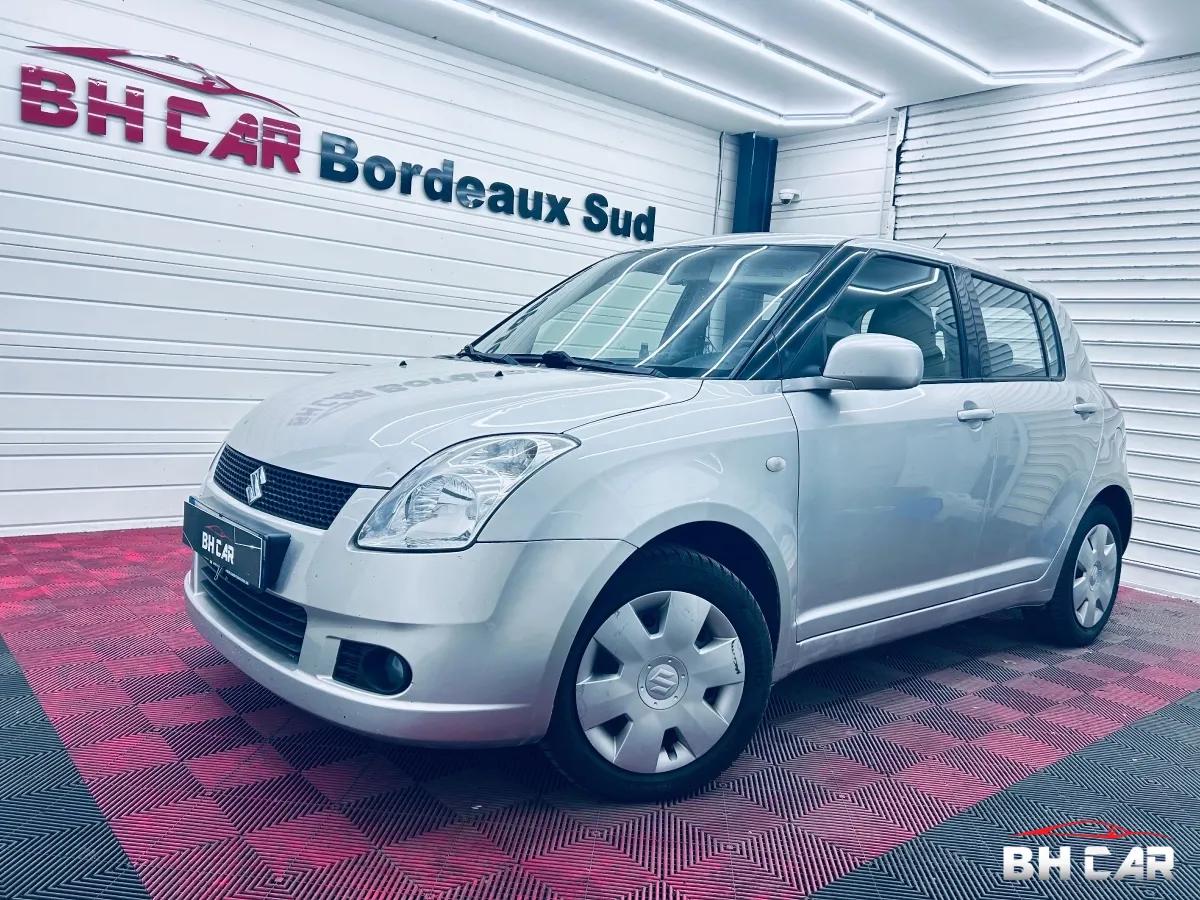Image: Suzuki Swift 1.3 DDIS 75 4X4 // Clim - Sièges chauffants - 5 Portes